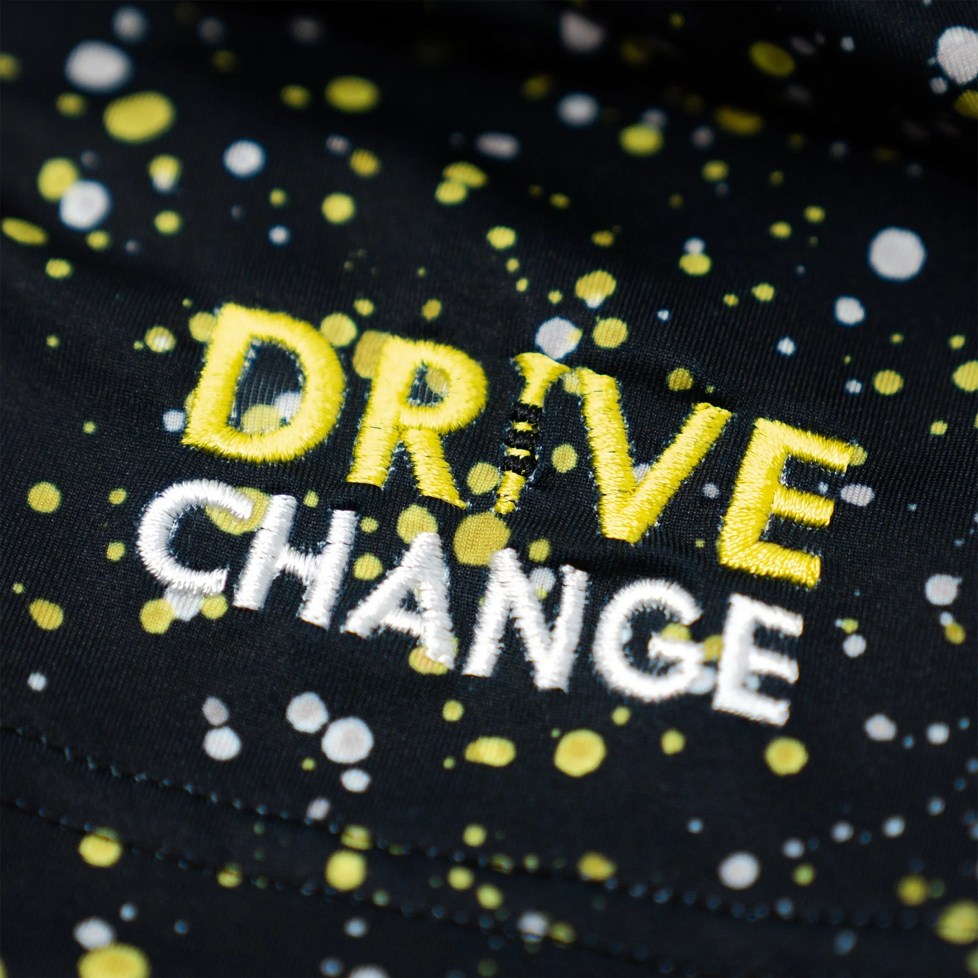 The Bootleg Splatter | Performance Polo | The Bootleg Splatter - Black/Sun Yellow - Drive Change - Image 3