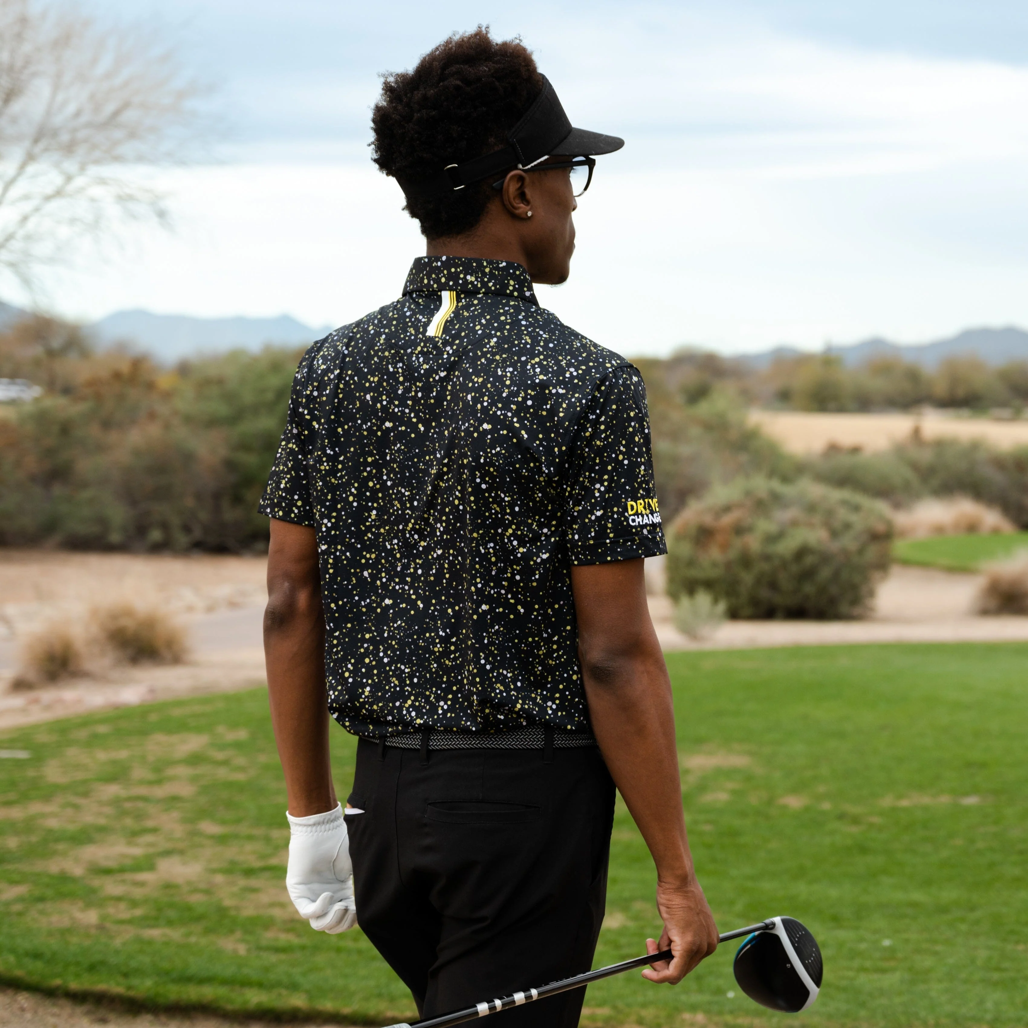 The Bootleg Splatter | Performance Polo | The Bootleg Splatter - Black/Sun Yellow - Drive Change - Image 6